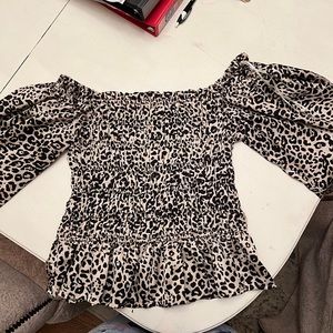 Entro brand smocked long sleeve off shoulder cheetah print shirt. Size medium.